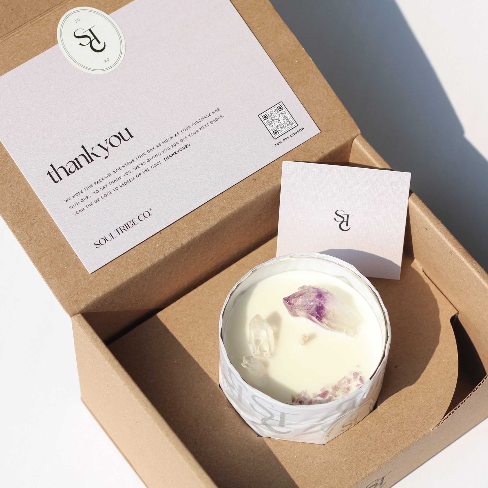 Eco-friendly candle packaging with crystal card insert