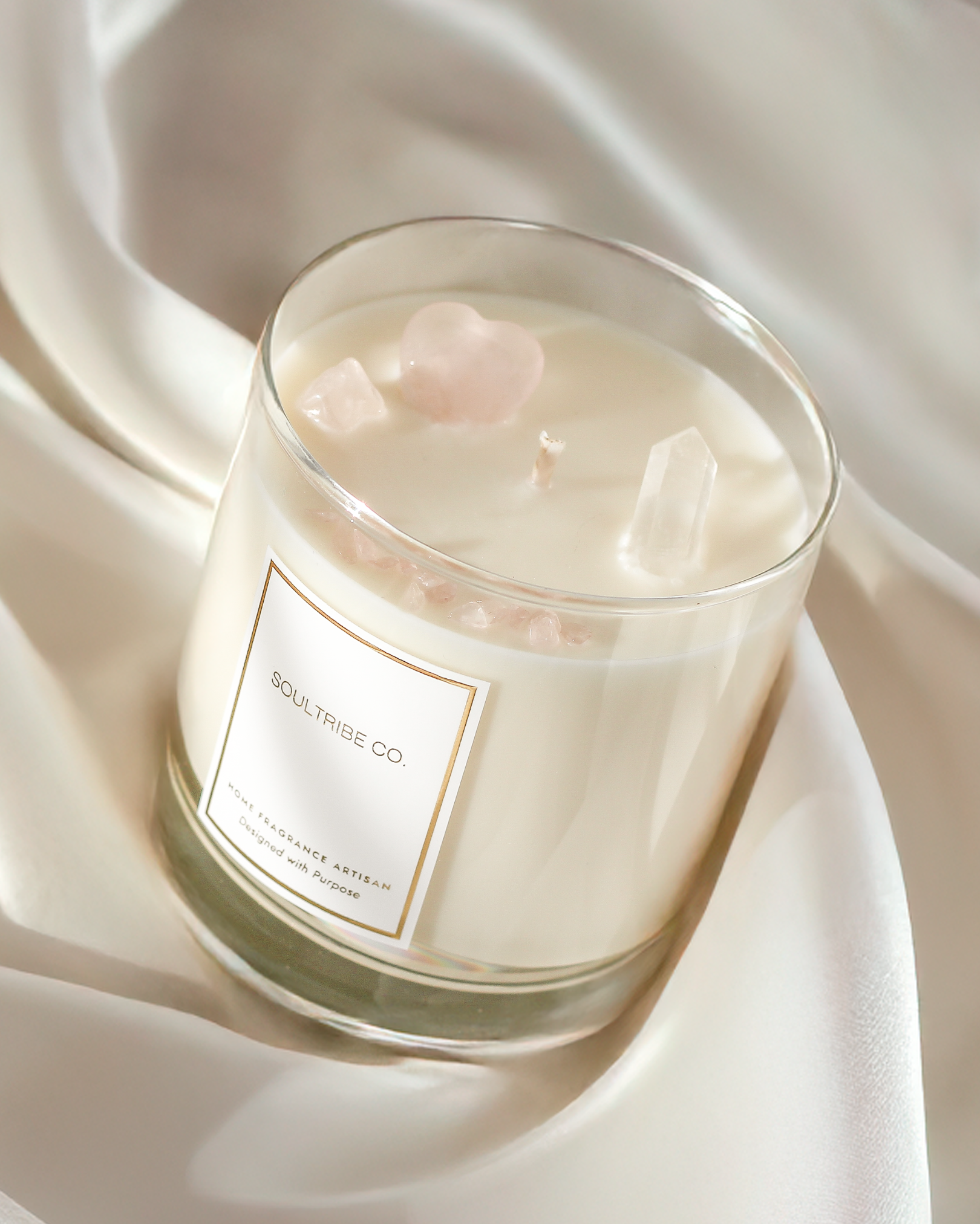 Close-up of Rose Quartz crystals in the Love Intention Candle, a thoughtful Valentine's Day gift for women.